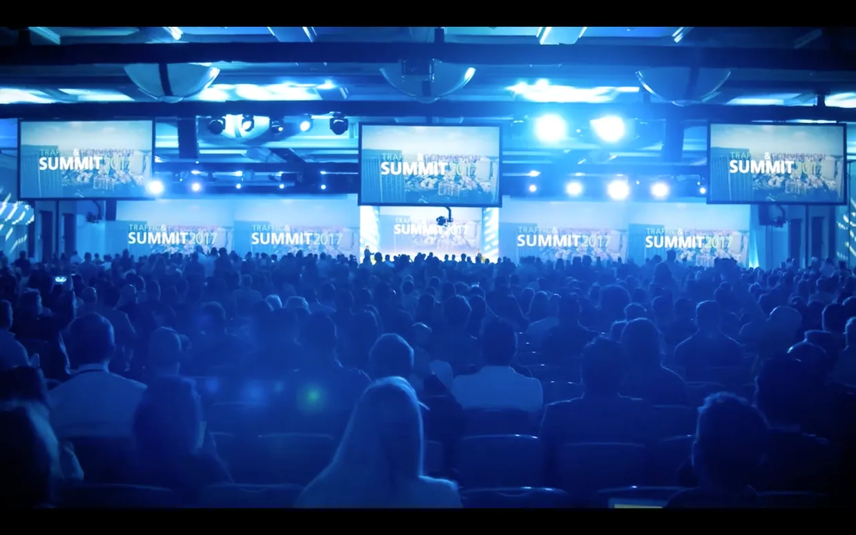 Traffic and Conversion Summit 2017 main stage, a packed ballroom lit blue